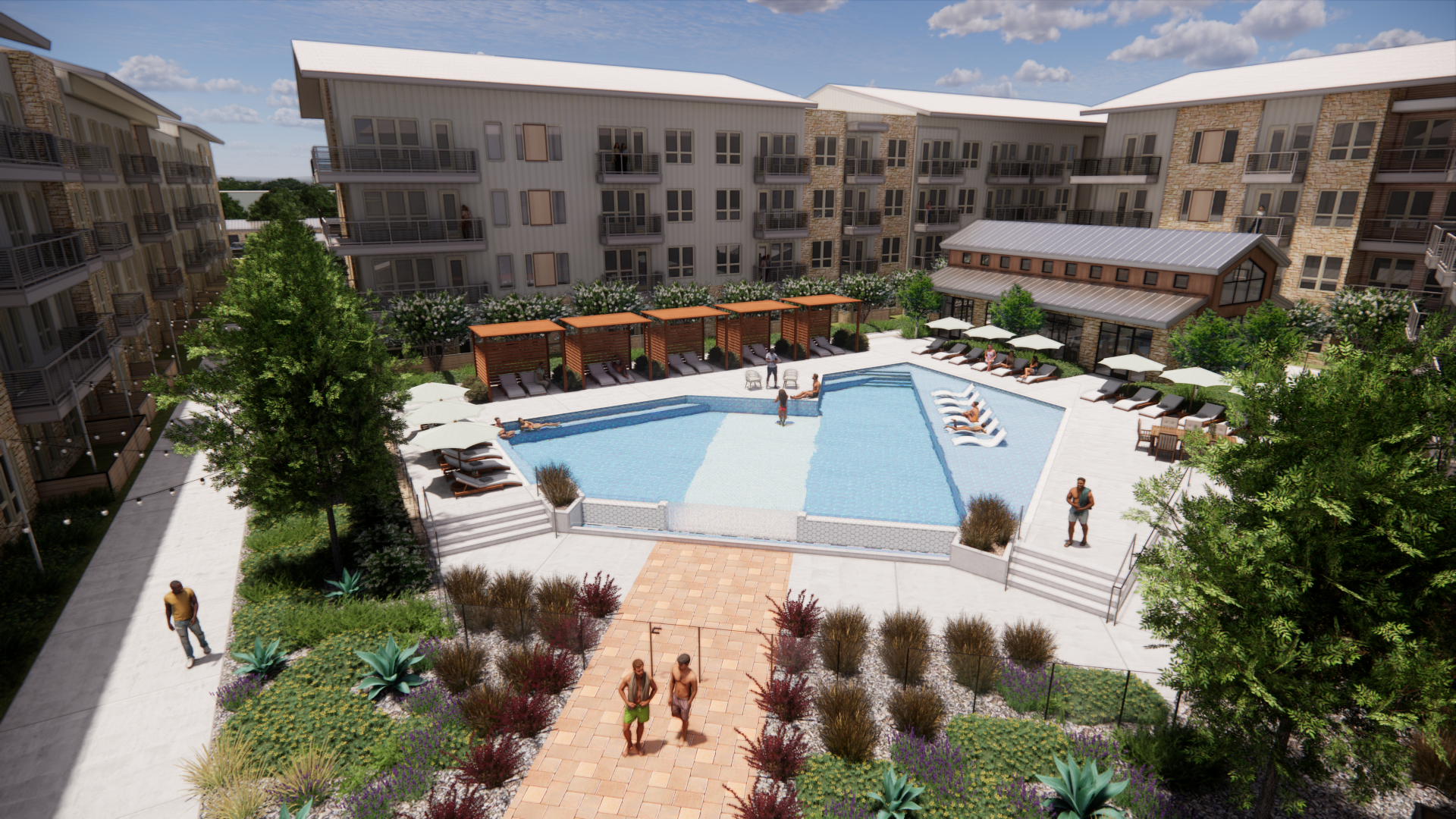 Aerial view of an apartment complex pool area with sunbeds, a few people standing and walking around, surrounded by landscaped greenery and multi-story buildings.